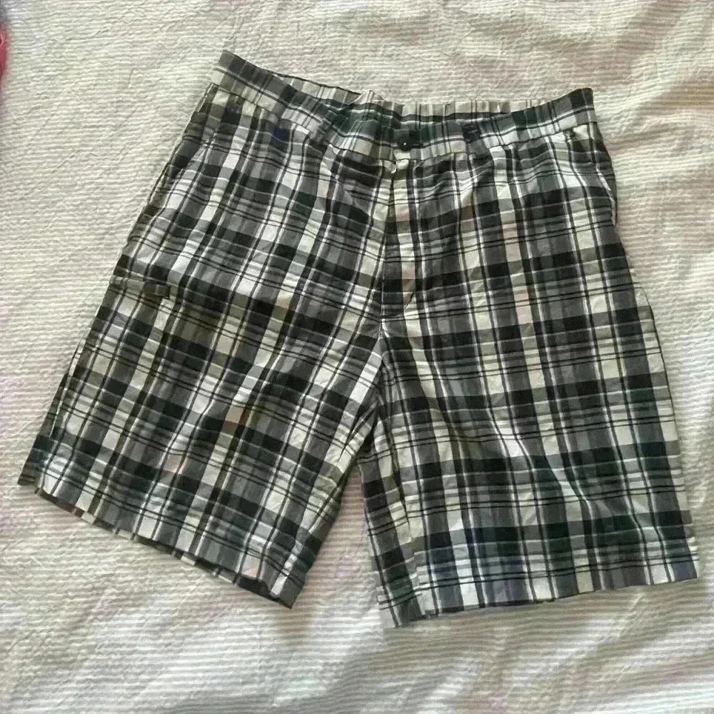 Blue, black and white plaid men’s shorts size medium/large